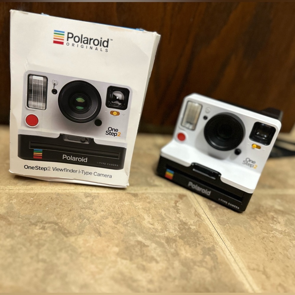 One step two Polaroid camera. Great condition. Just the camera no film